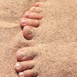 winterhanden voeten strand tenen vrouwelijk